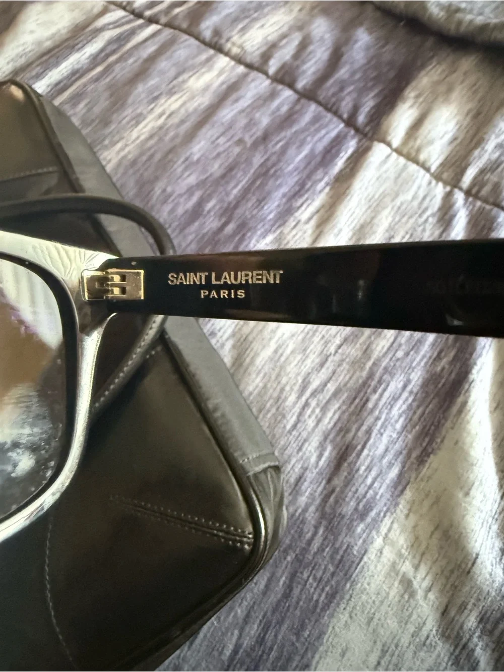 Saint Laurent Black Frame Sunglasses with Purple Mirrored Lenses